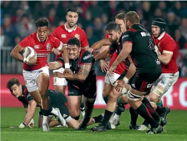  ?? PHOTO: DAVID ROGERS/GETTY ?? The Lions tour has brought Northern Hemisphere scrutiny to the state of the game in New Zealand. Here the Lions’ Anthony Watson is seen ominously busting through the Crusaders defense.