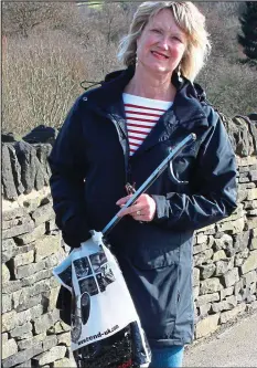  ??  ?? Determined: Helen Johansson picks up litter every day