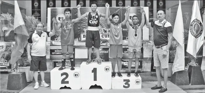  ??  ?? MEDALISTS. The medalists of the recently-concluded PSC-Pacquaio Amateur Boxing Cup National Championsh­ips junior boys 50-kilogram division with bronze winner Reymond Albupera of Davao City, fourth from left. PSC