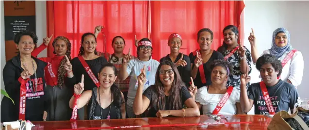  ??  ?? One Billion Rising Global Director Monique Wilson (front row, first from left) with One Billion Rising Fiji Co-ordinator Roshika Deo (front row, second from left) and other local activists.