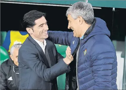  ?? FOTO: GETTY IMAGES ?? Marcelino saluda a Setién antes del Betis-Valencia de Copa de este jueves, duelo que terminó con empate a dos