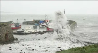  ??  ?? Storm Ophelia batters Fethard Dock. Photo: Liam Ryan.