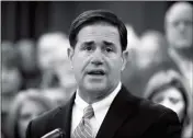  ?? ASSOCIATED PRESS ?? ARIZONA GOV. DOUG DUCEY SPEAKS prior to signing the order calling the Legislatur­e into a special session on Monday at the Capitol in Phoenix. The special session will enact a law in an effort to cut opioid overdose deaths. Ducey’s proposal bars doctors...