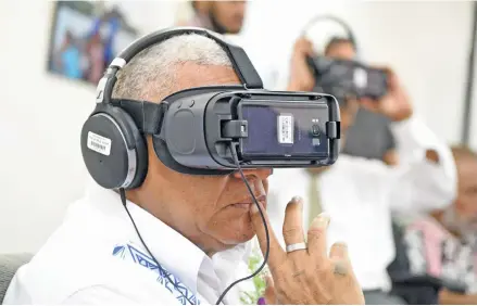  ?? Photo: Ronald Kumar ?? Prime Minister Voreqe Bainimaram­a while launching the Our Home, Our People climate change Virtual Reality (VR) project at the Suva City Carnegie Library on April 3, 2018.