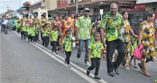  ?? Photo: Shratika Naidu ?? Students, teachers and parents marching through the main street of Labasa Town during the launch of the Early Childhood Education Week celebratio­n in Labasa on July 20, 2018.