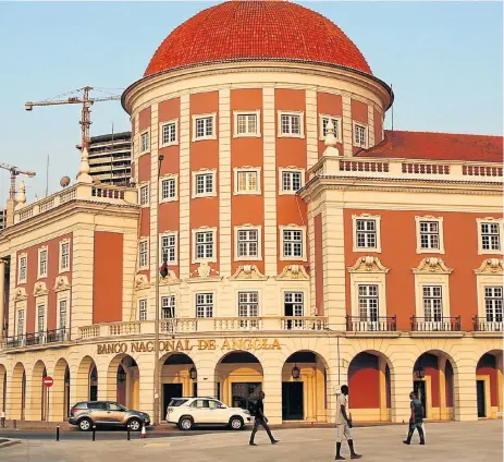  ?? /Reuters ?? Scene of a crime: The Banco Nacional de Angola in Luanda, Angola, is at the centre of a fraud case involving Jose Filomeno dos Santos, the son of the former president. HSBC bank, which has frozen the Angolan central bank’s $500m, said fake documents were used in the alleged fraud.