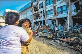  ?? Iqbal Lubis EPA/Shuttersto­ck ?? A DEVASTATED hotel in Palu, provincial capital of Central Sulawesi. Quake and tsunami survivors are frustrated by the lack of food, water and other necessitie­s.