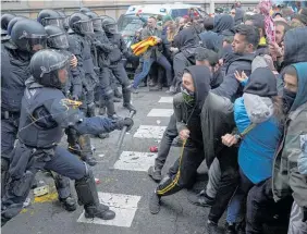  ?? Picture / AP ?? Police clashed with protesters in Barcelona after Carles Puigdemont’s arrest in Germany.