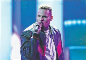  ?? Matt Sayles The Associated Press ?? Talented but controvers­ial R&B artist Chris Brown’s concert series at Drai’s Nightclub at The Cromwell is scheduled to start June 11.