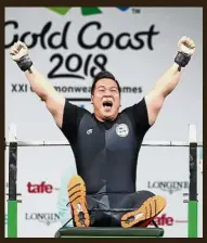  ?? — GLENN GUAN / The Star ?? Inspiratio­nal: Alia Sazana Azahari showing her bronze medal after the women’s 25m pistol final at the Belmont Shooting Centre yesterday. Above: Powerlifte­r Jong Yee Khie celebratin­g after his silver-medal effort in the men’s above 77kg category.