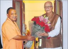  ?? PTI ?? BJP leader LK Advani (R) with Uttar Pradesh chief minister Yogi Adityanath, New Delhi, March 21. Adityanath’s hardliner Hindutva image can help the party polarise voters.