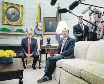  ?? Evan Vucci Associated Press ?? HEALTH AND HUMAN Services Secretary Alex Azar, center, f lanked by President Trump, discusses a plan to ban most f lavored vaping products. Azar said it “will take several weeks” to draw up and enact the ban.