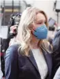  ?? AP PHOTO/NIC COURY ?? Elizabeth Holmes walks into the federal courthouse for her trial in San Jose, Calif., on Wednesday.