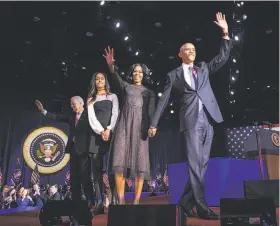  ?? Zbigniew Bzdak / Chicago Tribune ?? President Obama is joined onstage by first lady Michelle, daughter Malia and Vice President Joe Biden after his farewell address to 18,000 in Chicago.