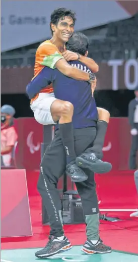  ?? GETTY IMAGES ?? Pramod Bhagat celebrates after beating Britain’s Daniel Bethell in the badminton men's singles SL3 final in Tokyo.