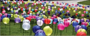  ?? Signal file photo ?? Lanterns, placed on a lawn at College of the Canyons, aim to spread awareness on suicide and mental health issues. Organizati­ons have announced events for suicide awareness month and domestic violence awareness month.