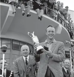  ?? Picture: PA. ?? A young Mr Palmer with the British Open Golf Championsh­ip trophy at the Royal Birkdale, Lancashire.