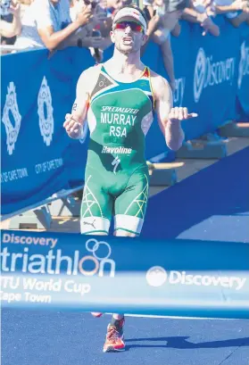  ?? Picture: Gallo Images ?? MAKING NO MISTAKE. South Africa’s Richard Murray crosses the finish line to win the men’s elite race during the Cape Town leg of the Triathlon World Cup on Saturday.