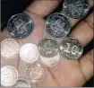  ?? PHOTO: TAWANDA: KAROMBO ?? Zimbabwe’s bonded coins lack credibilit­y.