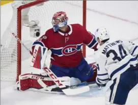 ?? GRAHAM HUGHES, THE CANADIAN PRESS ?? Toronto Maple Leafs’ Auston Matthews scores on Canadiens goaltender Carey Price in overtime. The Leafs were outshot, and outplayed at times, but found a way to win.