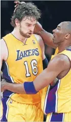  ?? Photo: Reuters ?? Kobe Bryant celebrates with Pau Gasol during game seven, which they lost.