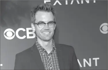  ?? Chris Pizzello/AP ?? Actor: Tyler Hilton, poses at the premiere of the CBS series "Extant," in Los Angeles. Hilton has managed to straddle the gap between acting and singing since he burst onto the scene at 19 playing Elvis in “Walk the Line” in 2005 opposite Joaquin Phoenix and Reese Witherspoo­n. He later joined the “One Tree Hill” cast for eight seasons, combining music and acting.