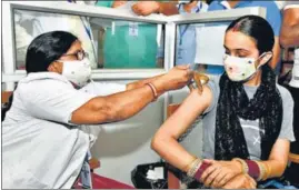  ?? ANI ?? A woman gets inoculated against Covid, in Bikaner on Sunday.
