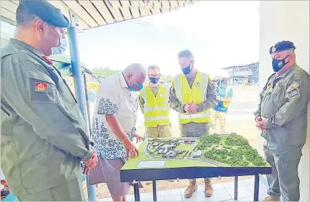 ?? Picture: FIJIAN GOVERNMENT ?? Prime Minister Voreqe Bainimaram­a is briefed by Captain Cameron Lang, the Australian Army’s team leader at Blackrock. The PM was visiting the Republic of Fiji Military Forces Blackrock redevelopm­ent project in Nadi.