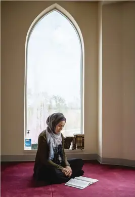  ??  ?? LEFT: Felicia Salameh sits in the Prayer Center of Orland Park, where she is an active member.