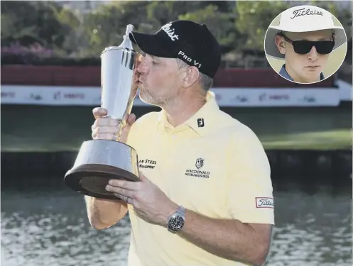  ??  ?? 0 Stephen Gallacher kisses the trophy following his victory in the Hero Indian Open. Inset, son Jack who caddied for his dad.