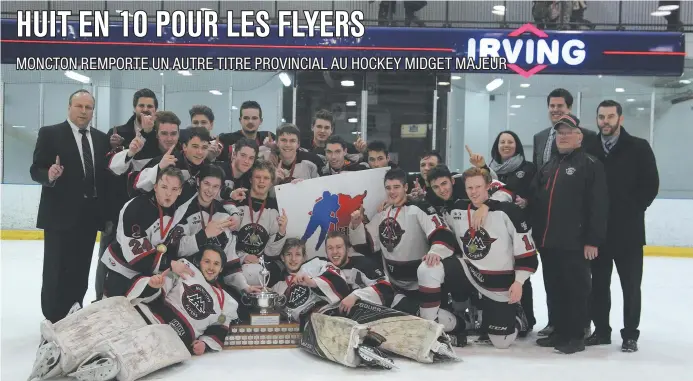  ?? - Collaborat­ion spéciale: Normand A. Léger ?? Les Flyers de Moncton sont des habitués de la traditionn­elle photo des champions des séries éliminatoi­res dans le circuit midget majeur.