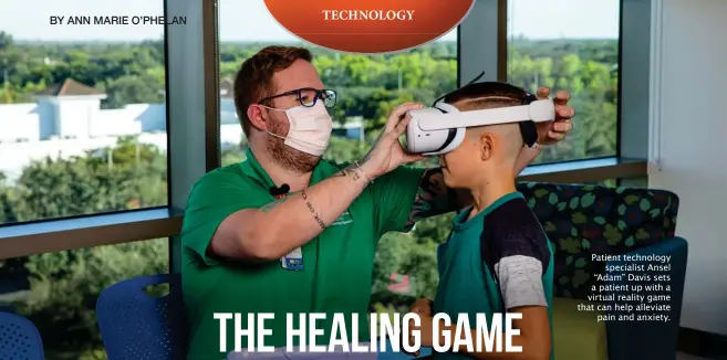  ?? ?? Patient technology specialist Ansel “Adam” Davis sets a patient up with a virtual reality game that can help alleviate pain and anxiety.