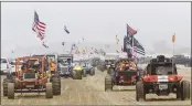  ?? DAVID MIDDLECAMP — THE TRIBUNE OF SAN LUIS OBISPO ?? Hundreds of dune buggies parade along the Oceano Dunes State Recreation­al Vehicle Area.