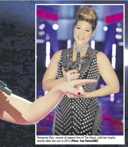  ?? (Photo: Trae Patton/nbc) ?? Tessanne Chin, winner of season five of The Voice, with her trophy shortly after the win in 2013