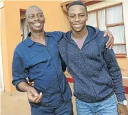  ??  ?? Proud father Stanley Mkhondo rejoices with son Quintine who read towards a BSc degree in actuarial science and financial mathematic­s. He has already begun his honours degree.