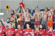  ?? Bjorn Lindgren/the Associated Press ?? Canadian supporters cheer Thursday during the quarter-finals at the world junior hockey championsh­ips in Malmo, Sweden.