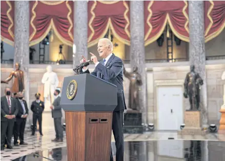  ?? ?? ON THE ATTACK: President Joe Biden speaks in Statuary Hall in Washington on Thursday, marking one year since the deadly assault on the Capitol.