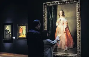  ?? PHOTO: GETTY IMAGES ?? Capital investment . . . Visitors view a 1641 painting by Sir Anthony Van Dyck, worth more than £5 million ($NZ9.7 million), during a media preview at Christie’s last year.