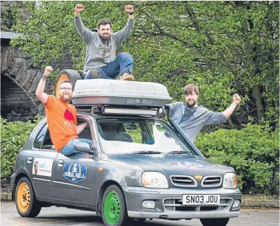  ?? Picture: Fraser Band. ?? The intrepid trio with their 2002 Nissan Micra.