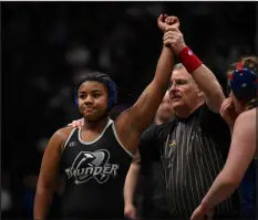  ?? RJ SANGOSTI — THE DENVER POST ?? Discovery Canyon senior Janida Garcia wins her 145-pound match during the first day of the CHSAA state wrestling tournament at Ball Arena on Thursday.