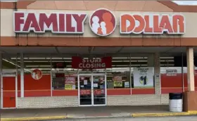  ?? Ciara McEneany/Post-Gazette ?? Family Dollar, at 27 Duquesne Blvd. in Duquesne, has a banner announcing the store will be shuttered. The store does not have an official closing date.