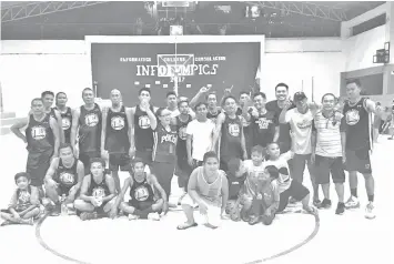  ??  ?? Team Polog under the flagship of Barangay Captain Glen Reuyan and head coach Marc Bryan Flores celebrates after they dethroned Garing, 66-62, to bag the Inter-Barangay Seniors Category B crown of the 7th Mayor Teresa 'Nene' P. Alegado Fiesta Basketball...