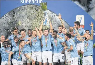  ?? REUTERS ?? Lazio players celebrate winning the Italian Super Cup in Riyadh on Sunday.