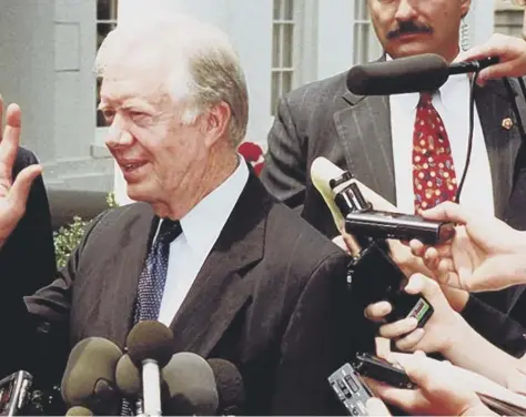  ??  ?? 2 Jimmy Carter with reporters at the White House after talks with North Korean leader Kim Il Sung in 1994. The former president, now 93, reckons he could still help to find a way ahead