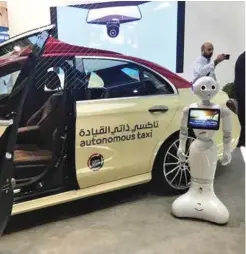  ??  ?? BELOW: Automated taxis on display at GITEX 2018