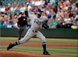  ?? ASSOCIATED PRESS ?? IN THIS JUNE 1, 2018, FILE PHOTO, Tampa Bay Rays pitcher Sergio Romo throws to a Seattle Mariners batter during a game in Seattle. Romo is with the Miami Marlins this year.