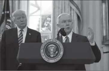 ?? The Associated Press ?? TRUMP AND RUSSIA: In this Feb. 9, 2017, photo, President Donald Trump listens as Attorney General Jeff Sessions speaks in the Oval Office of the White House in Washington, after Vice President Mike Pence administer­ed the oath of office to Sessions....