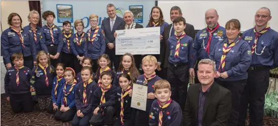  ??  ?? The Avoca scouts and beavers receiving the Best Natural Heritage Award from Ian Davis, Frank Curran, Cllr Pat Vance and Minister Andrew Doyle.
