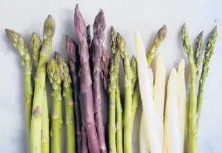  ??  ?? Both thick and thin asparagus have their places in the kitchen, and the fresher they are, the better. KARSTEN MORAN/THE NEW YORK TIMES