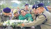  ??  ?? Wife of subinspect­or Imran Tak wailing during the wreathlayi­ng ceremony held at Udhampur on Saturday. Tak was killed in a militant attack in the Zakura area on the outskirts of Srinagar on Friday. HT PHOTO